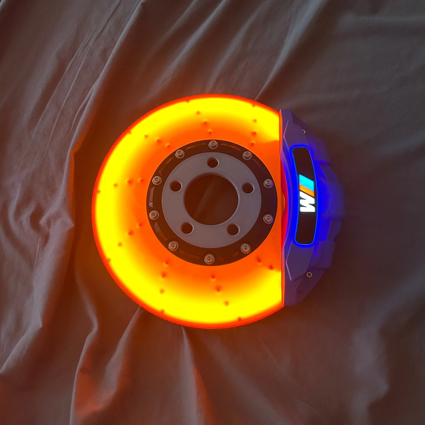 Neonbrakes® lampa LED w kształcie tarczy hamulcowej