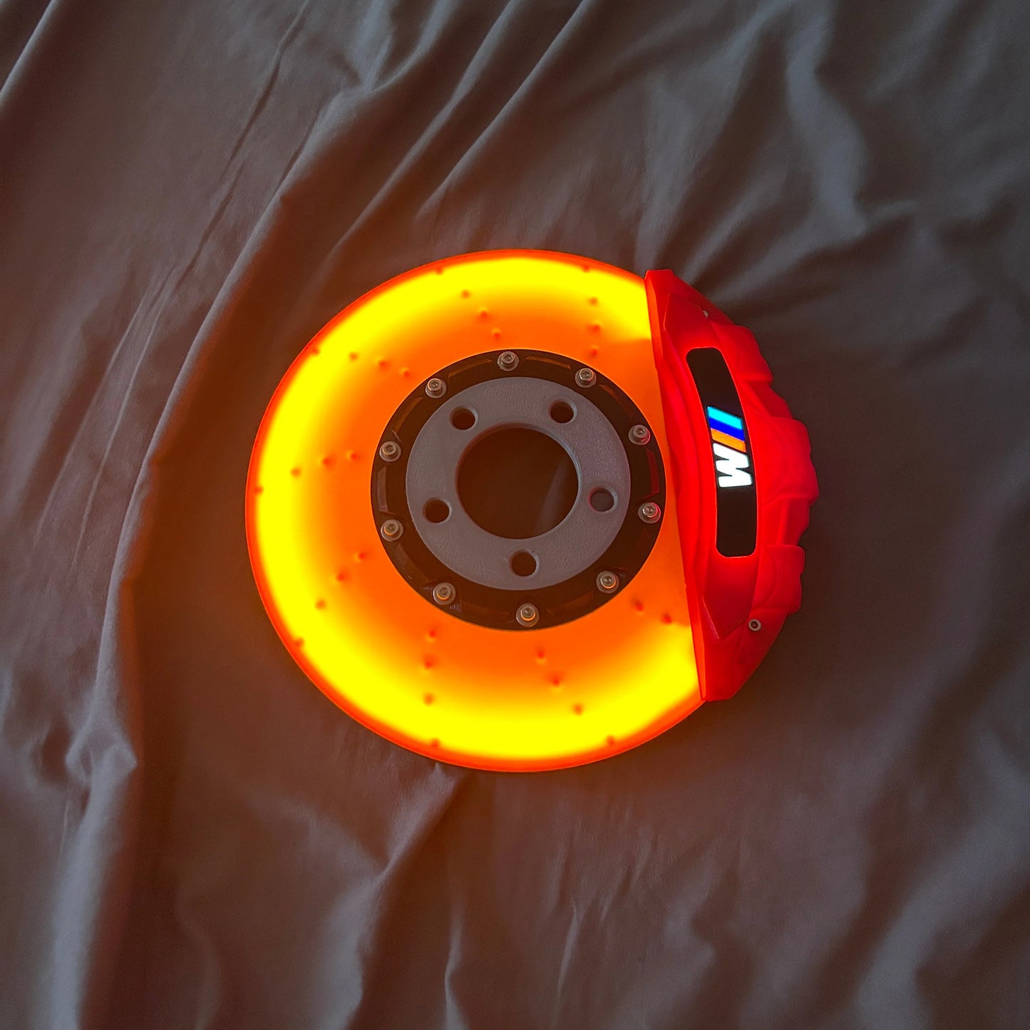 Neonbrakes® lampa LED w kształcie tarczy hamulcowej